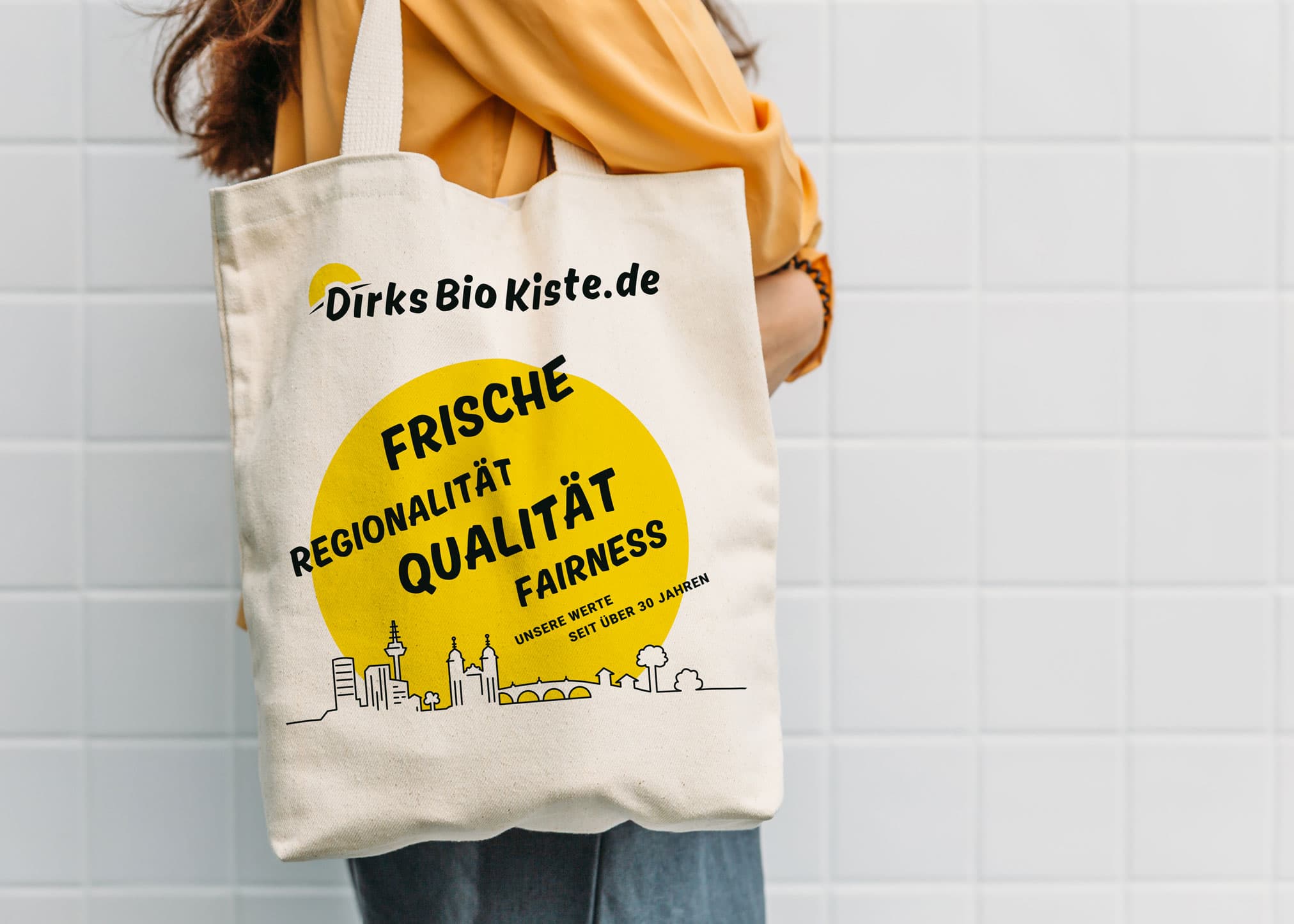 Tote Tasche mit Dirks Bio-Kiste Logo, das die Markenidentität und ihre Werte erfasst.